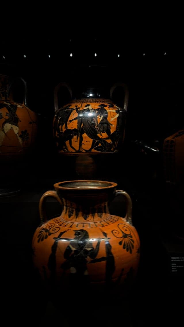 Greek vases against black — reel still