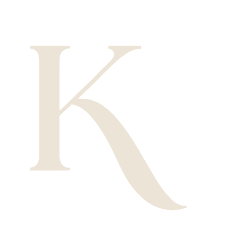 KOHL monogram — a serif K nested in a fine circle